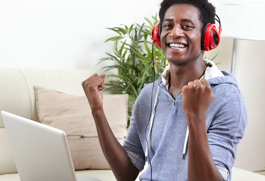 Afro-american man listening music.