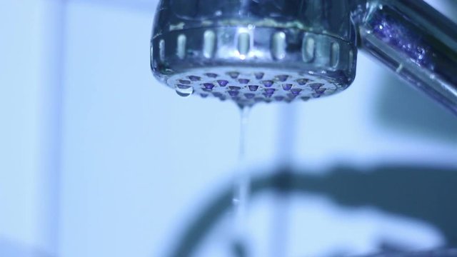 Water flows from the tainted shower
