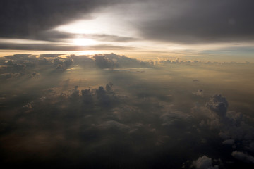 View of the clouds and airplane wing from the Inside