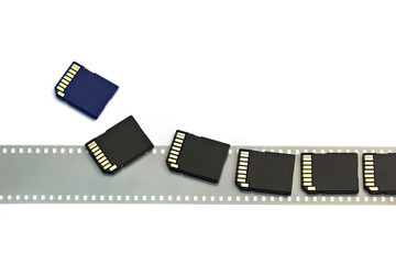 Old film and modern digital compact SD cards isolated