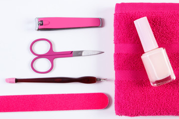 Cosmetics and set of manicure or pedicure tools, concept of nail care