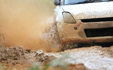 Gordijnen Rally car in muddy road © toa555