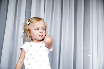 Little girl talking on mobile phone