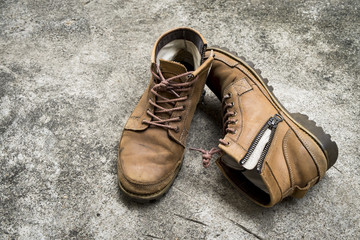 Men leather shoes on a concrete floor