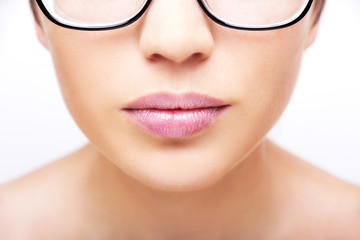 Obraz premium Plump sexy lips and perfect skin on a white background