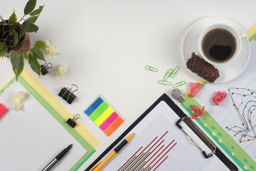 Business blank, notepad, coffee cup and pen at office desk table top view. Corporate stationery branding mock-up