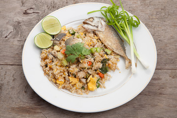Fried rice with mackerel, egg, carrots, kale, spinach, egg yolk,