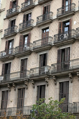 Fototapeta na wymiar Building with plenty of balconies in pattern shape