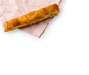 Puff pastry with a rough pink tablecloth