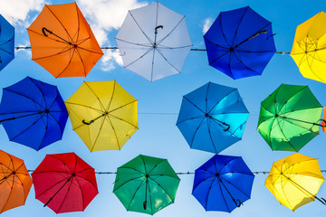 Colorful umbrellas with blue sky background