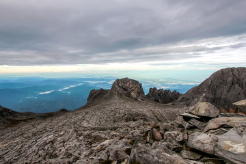 Fototapeta na wymiar Kinabalu rock mountain with cloudy sky landscape