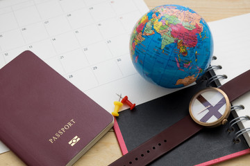 accessories for plan in travel concept on wooden background
