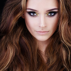 Fototapeta premium Beauty Portrait of Pretty Woman with Brown Hair. Beautiful Face