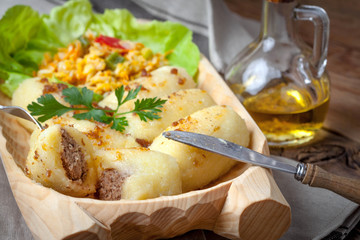 Potato dumplings stuffed with minced meat.