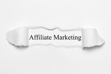 Affiliate Marketing on white torn paper
