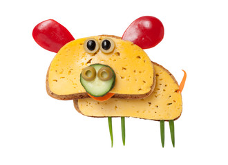 Pig made of bread and cheese on white background