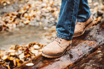 Hiker walking in boots closeup