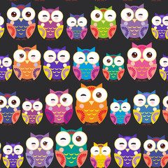 Seamless pattern - bright colorful owls on black background. Vector