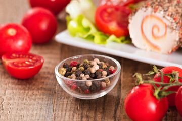 Goat cheese with salad and cherry tomatoes. 
