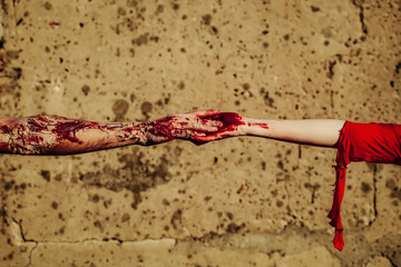 Two bloody zombie hands