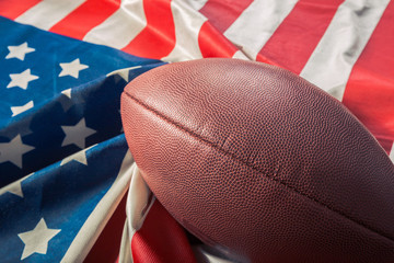 American football on American old glory flag