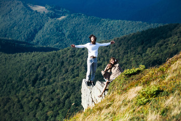 Romantic couple on mountain top