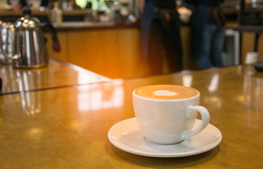 Coffee cup in coffee shop,copy space,selective focus.