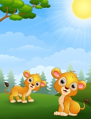 Two lion cub cartoon in the jungle 