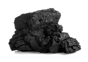 Obraz premium Natural wood charcoal isolated on white, traditional charcoal or