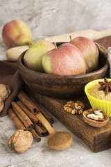 Apple pie ingredients over stone table