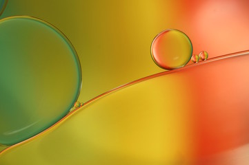 Oil drops on a water surface - abstract rainbow colored macro (450)