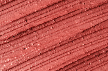 Red moroccan cosmetic clay texture close up. Abstract background.