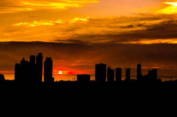 Fototapeta na wymiar Backlight of a building city in a beautiful sunset