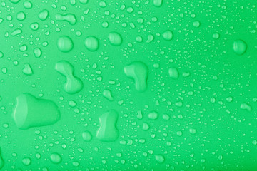 Drops of water on a color background. Toned