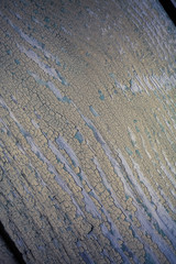Old wooden planks with peeling paint like background. Toned