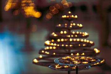 Beautiful little candles burning in church