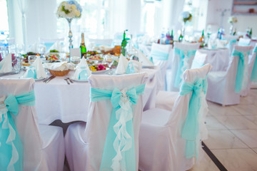 Beautiful white chairs prepared for guests