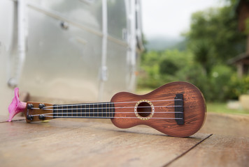 Ukulele vintage stone floor.