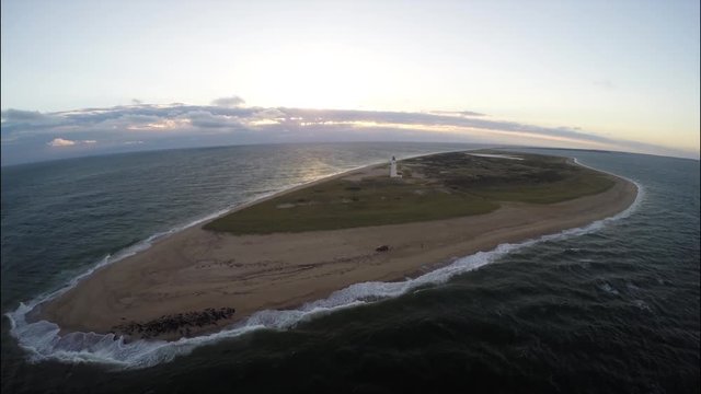 Sunset seascape aerial with seals, Nantucket, Massachusetts.