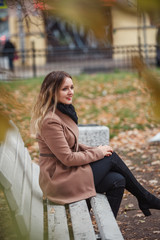 Beautiful girl in autumn Park