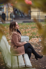 Beautiful girl in autumn Park