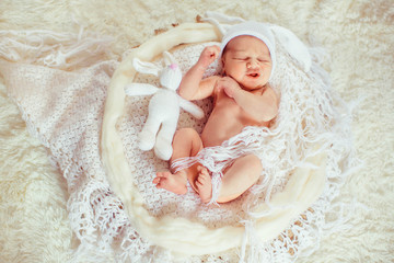 Incredible and sweet newborn baby sleeps in basket