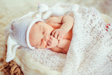 Incredible and sweet newborn baby sleeps in basket