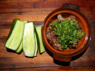 Fried liver with dill and cucumbers