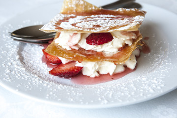 Millefeuille with strawberries and powdered sugar