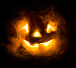 Fototapeta premium Halloween - old jack-o-lantern on black background
