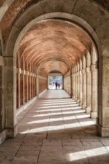 Fototapeta na wymiar Arches and passageway at the Palacio Real Aranjuez, Spain