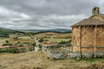 scenery with the apse of the Romanesque church of Santa Marina in villanueva of the tower in Palencia, Castile and León, Spain