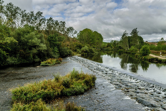 sight of the river Pisuerga to its step for villanueva of the tower in Palencia, Castile and León, Spain