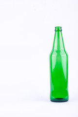 green beer glass bottle for beer beverage party on white background drink isolated
